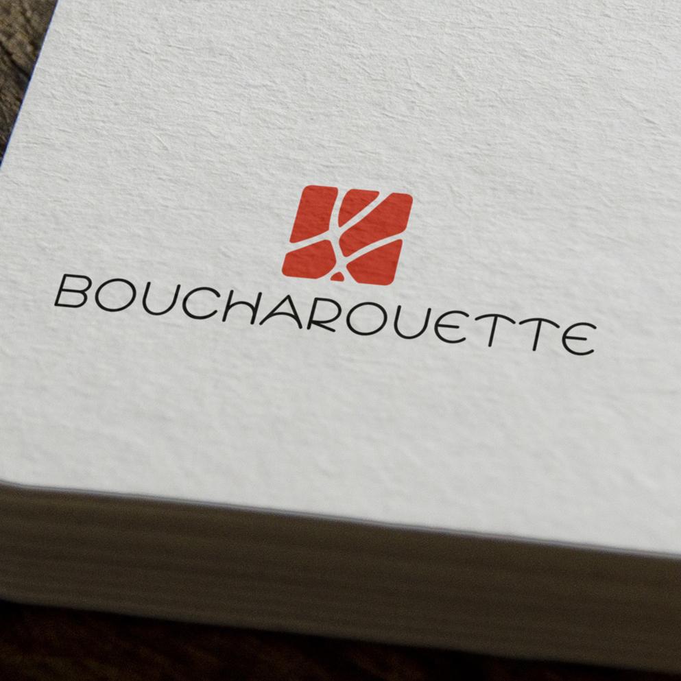 Conception de logotype vectorisé gravé sur papier pour entreprise en Suisse