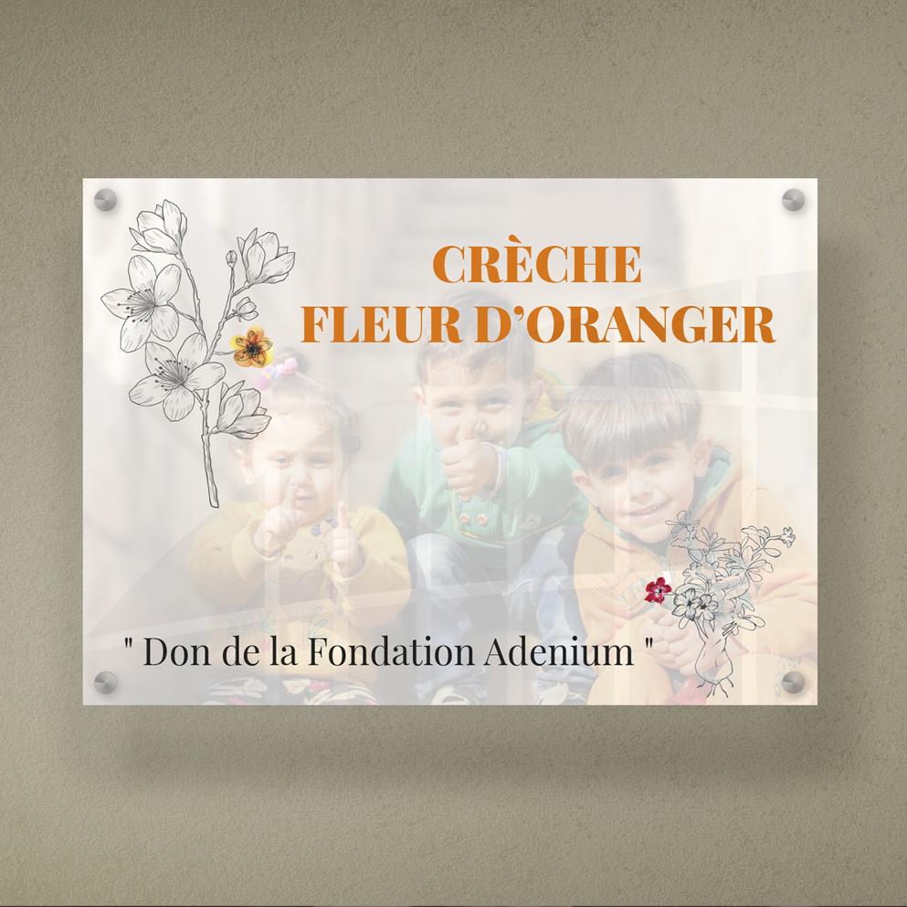 Design graphique de plaque murale personnalisable pour fondation en Suisse